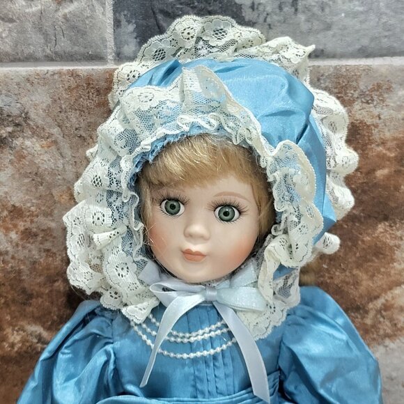 VTG Porcelain Doll Green Eyes Blue Satin Dress White Lace Trim Matching Bonnet - Picture 13 of 14